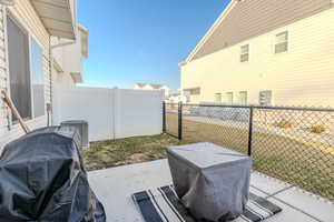 View of patio / terrace with grilling area and cooling unit