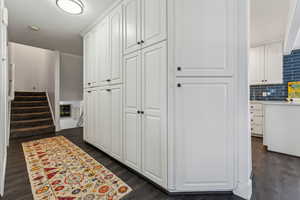 Interior space featuring dark hardwood / wood-style floors