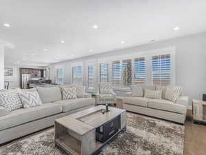 Living room with hardwood / wood-style flooring