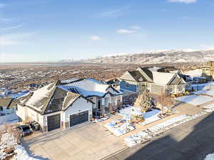 Snowy aerial view with a mountain view