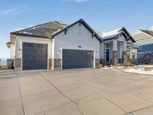 View of front of property featuring a garage