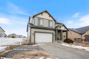 View of front of house with a garage