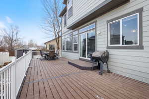 Deck with a storage shed and grilling area