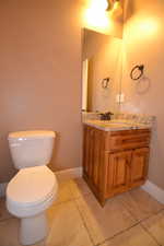 Bathroom with vanity and toilet