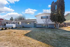 View of front of house featuring a front lawn