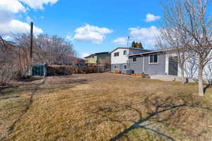 View of yard featuring cooling unit