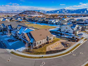 Birds eye view of property with a mountain view