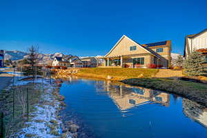 Property view of water with a mountain view