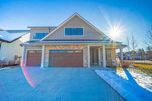 View of front of property with a garage