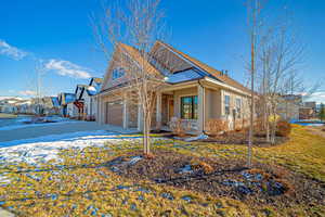 View of front of home featuring a garage