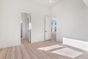 Unfurnished bedroom with light hardwood / wood-style flooring