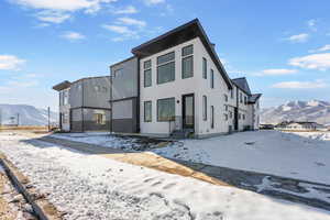 View of front of property with a mountain view