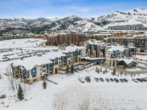 Snowy aerial view with a mountain view