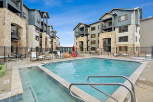 View of swimming pool featuring a patio