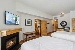 Bedroom featuring hardwood / wood-style flooring