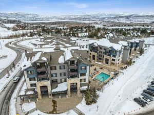 Snowy aerial view with a mountain view