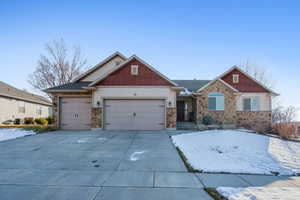 Craftsman-style house featuring a garage