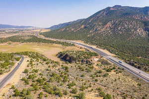 Drone / aerial view featuring a mountain view