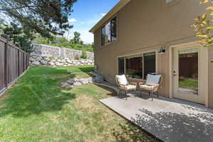 View of yard with a patio