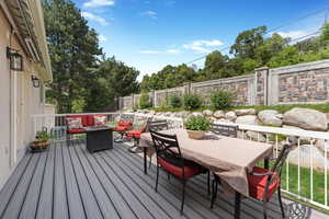 Deck with an outdoor fire pit