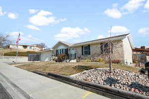 View of front facade with a front lawn