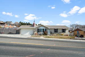 Single story home with a garage