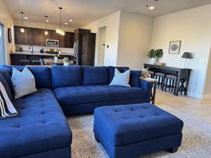 Tiled living room with sink