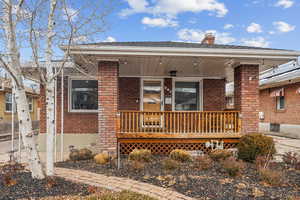 Exterior space featuring covered porch