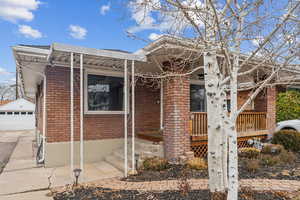 View of front facade with a garage and an outdoor structure