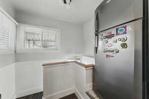 Washroom area with dark wood-type flooring