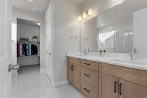 Primary bathroom featuring double vanity