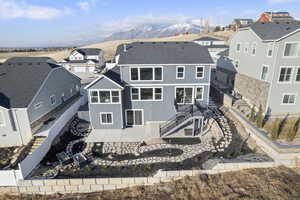 Birds eye view of property with mountain views