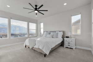 Primary bedroom on main level featuring mountain views