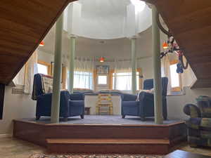 Turret nook with columns, high vaulted ceiling with skylight