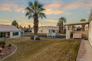 View of yard at dusk