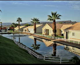 Property view of water with a mountain view