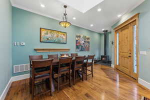 Dining space featuring a wood stove