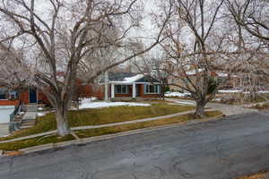 View of front of home featuring a yard