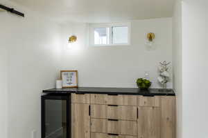 Interior details featuring indoor bar and beverage cooler