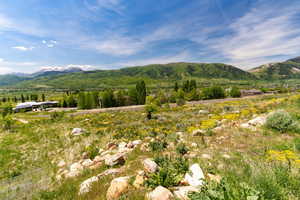 Property view of mountains featuring a rural view