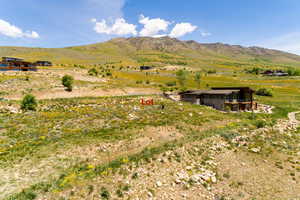 Property view of mountains featuring a rural view