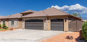 View of front of property with a garage