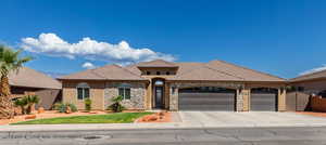 View of front of home with a garage