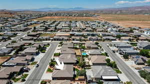 Birds eye view of property with a mountain view