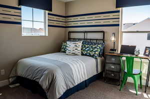 Bedroom featuring carpet floors