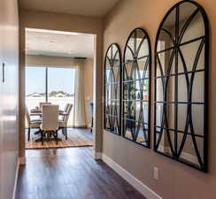 Hall featuring dark hardwood / wood-style floors