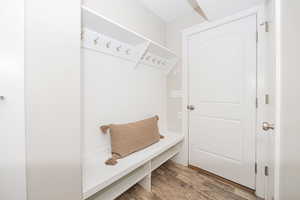 Mudroom featuring wood-type flooring