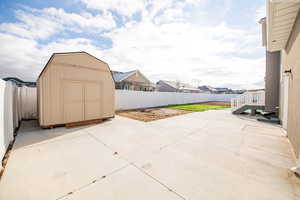 View of patio / terrace with a storage unit