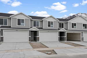 View of property featuring a garage