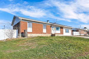 View of front of home with a front lawn